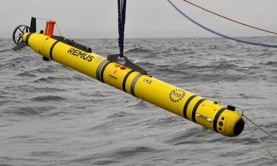 A REMUS-600 autonomous underwater vehicle being deployed from a research vessel
